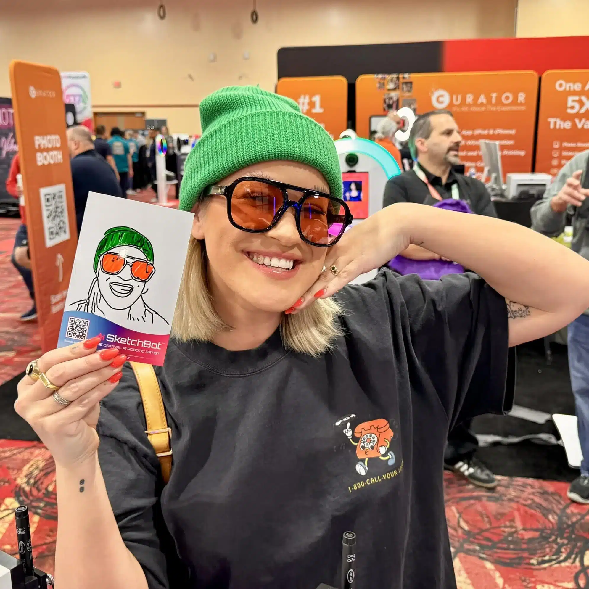 Guest holding a colored sketch portrait